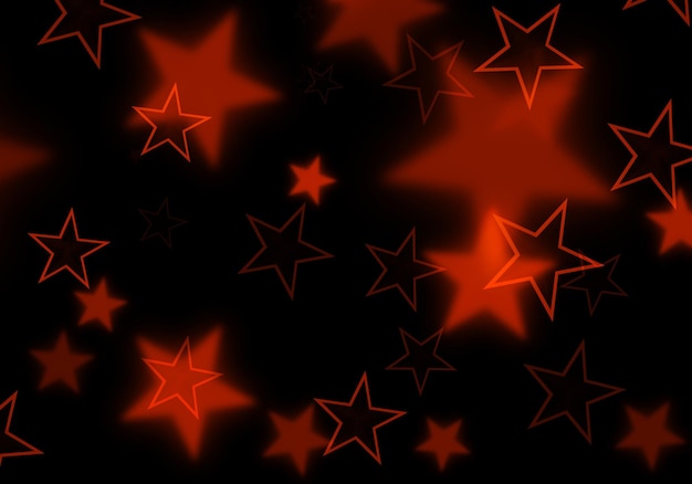 Estrella roja mágica desenfocada sobre un fondo negro