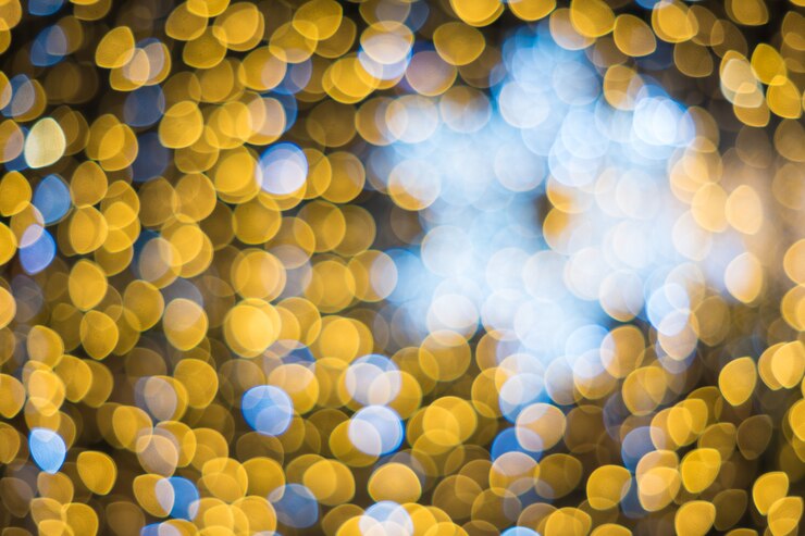 Foto estrellas brillantes en bokeh. fondo de navidad, hermoso