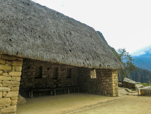 Estruturas de pedra esculpidas do Império Inca em Machu Picchu Cusco Cuzco Peru