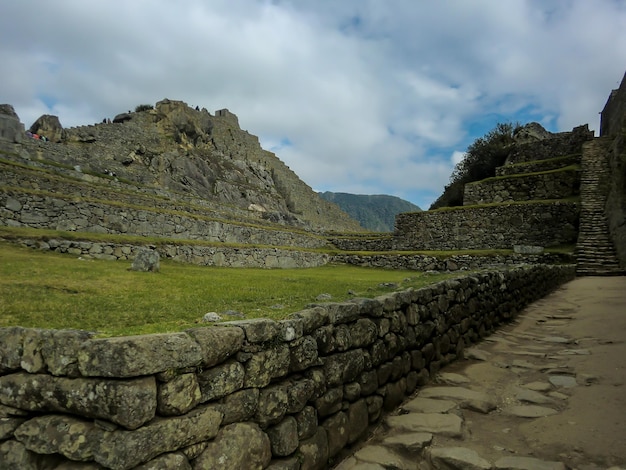 Estruturas de pedra esculpidas do Império Inca em Machu Picchu Cusco Cuzco Peru