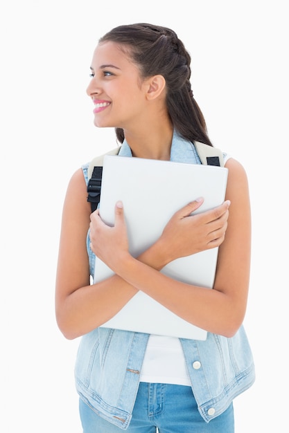 Estudante bonito segurando seu laptop