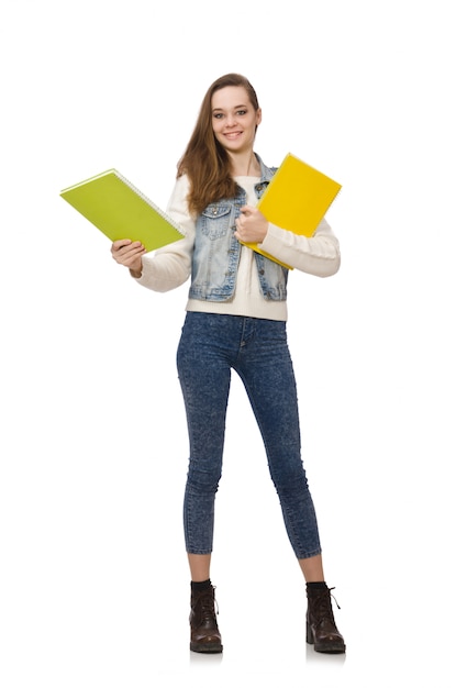 Estudiante bonito que sostiene los libros de texto aislados en blanco