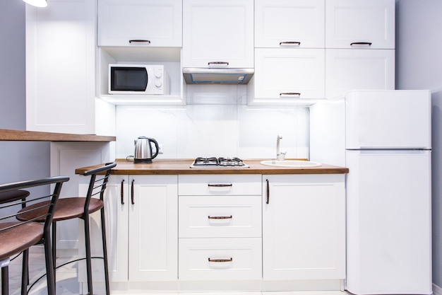 Foto estudio de cocina de estilo moderno, en blanco