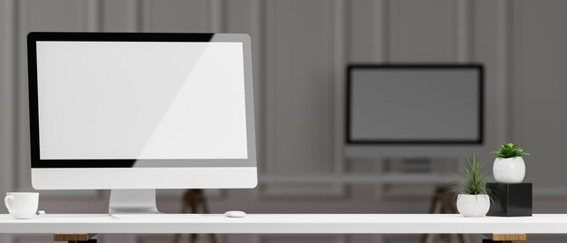 Estudio de oficina moderno y elegante con maqueta de pantalla en blanco de computadora de pc y espacio de copia en la mesa blanca