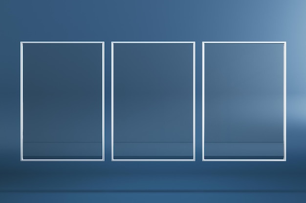 Foto esvazie três pôsteres de moldura de vidro retangular em fundo azul simule a renderização em 3d