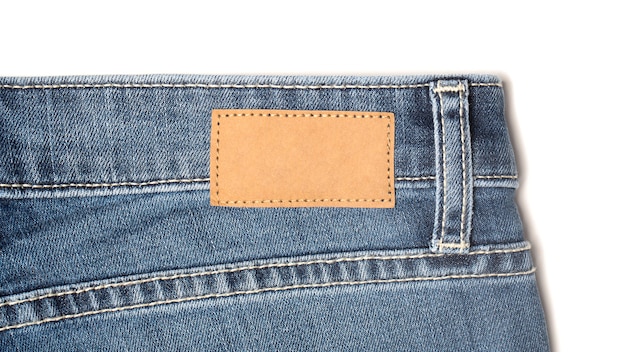 Etikett Preisschild Modell auf Blue Jeans aus Recyclingpapier.