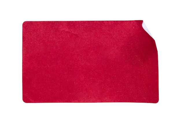 Etiqueta adhesiva de papel rojo aislado sobre fondo blanco.