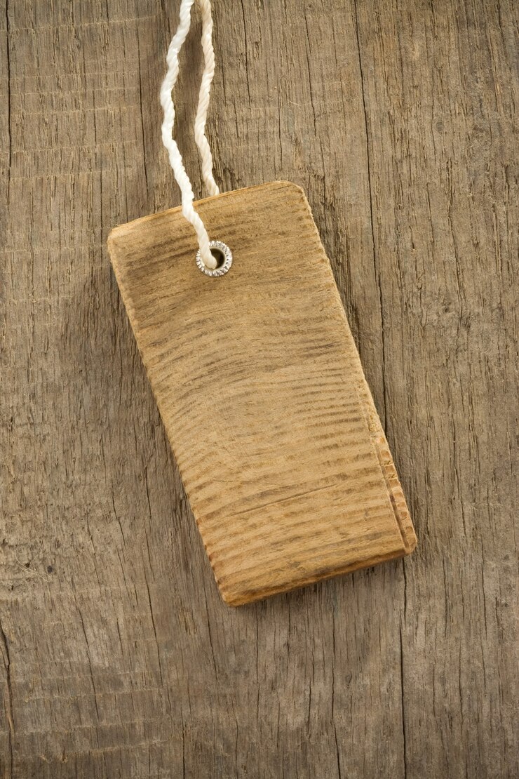 Foto etiqueta de precio sobre textura de fondo de madera
