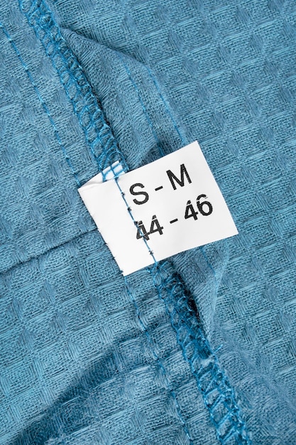 Etiqueta de ropa de talla SM