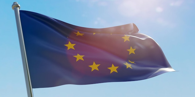 EU-Flagge der Europäischen Union weht vor blauem Himmel