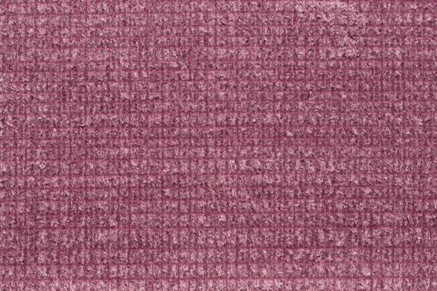 Excelente textura de tela en relieve en color rosa.