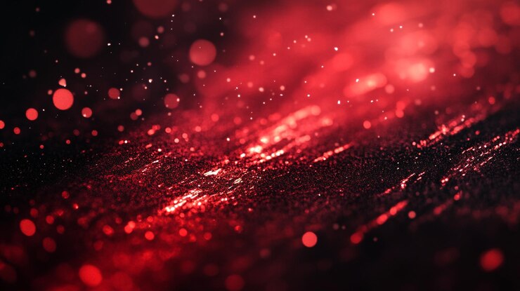 Exhibición dinámica de partículas rojas que crean un fondo de textura vibrante