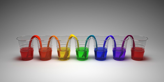 Foto experimento de agua caminando del arco iris sobre fondo vacío. concepto de ciencia vasos en fila con agua coloreada y papel mojado entre ellos.