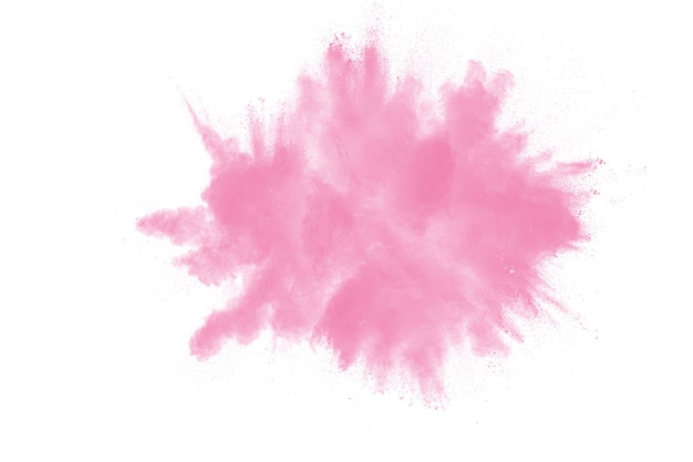 Explosão cor-de-rosa do pó isolada no fundo branco.