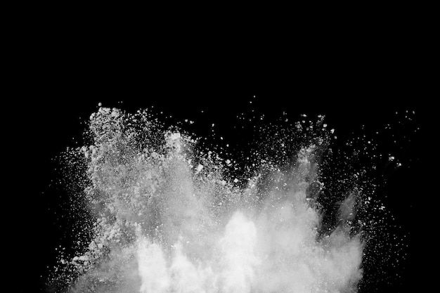 Foto explosión de polvo blanco sobre fondo negro nube de color explosión de polvo colorido pintura holi