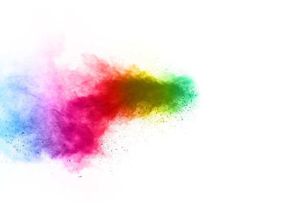 Explosión de polvo de colores sobre fondo blanco.