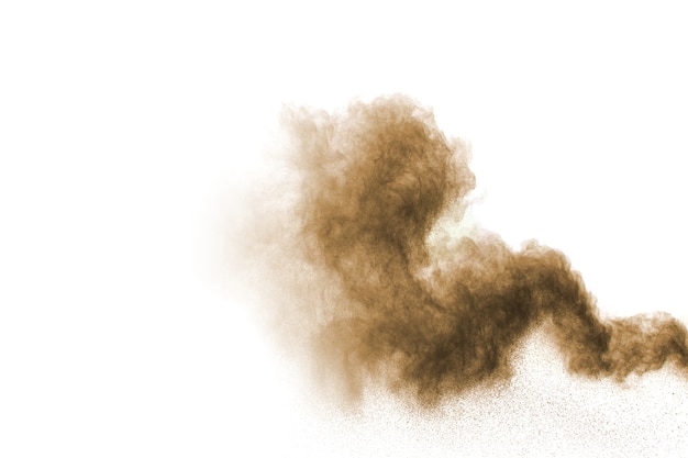 Foto explosión de polvo marrón abstracto.