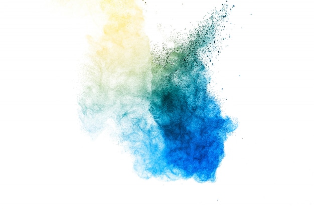 Explosion von blauem und gelbem Staub.