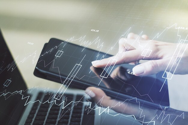 Exposição múltipla de gráfico financeiro criativo abstrato com prensas de dedo em um tablet digital em fundo forex e conceito de investimento