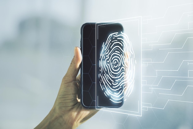 Exposição múltipla de holograma de impressão digital criativo e mão com telefone celular no conceito de dados biométricos pessoais de fundo