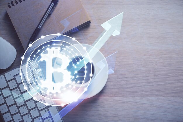 Exposición múltiple del dibujo del tema criptográfico y la vista superior de la mesa de trabajo Concepto de tecnología blockchain en los negocios