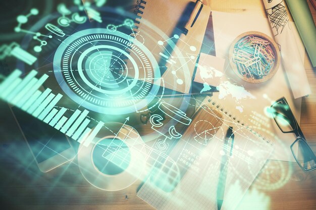 Exposición múltiple del dibujo del tema empresarial y la vista superior de la mesa de trabajo Concepto de finanzas internacionales