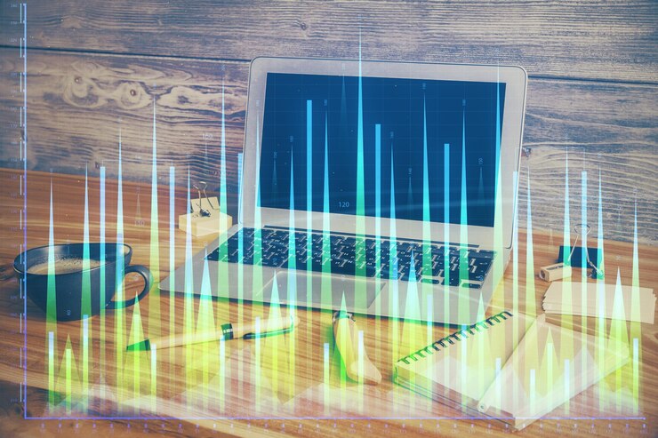 Foto exposición múltiple del gráfico forex y espacio de trabajo con computadora concepto de comercio internacional en línea