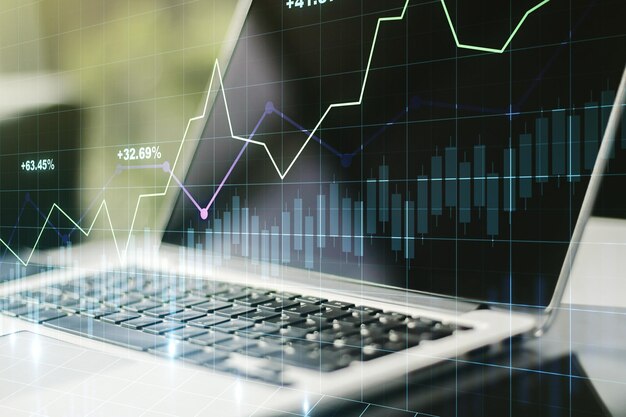 Exposición múltiple de gráficos financieros abstractos creativos en el concepto de investigación y análisis de fondo informático