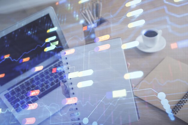 Exposición múltiple de manos de mujer trabajando en computadora y concepto de tecnología de dibujo de holograma de tema de datos
