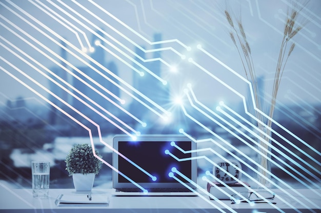 Exposición múltiple de una mesa con una computadora en el fondo y un dibujo temático de datos Concepto de innovación