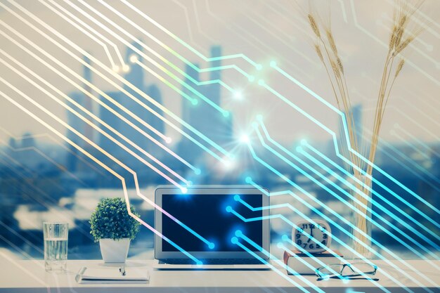 Exposición múltiple de una mesa con una computadora en el fondo y un dibujo temático de datos Concepto de innovación