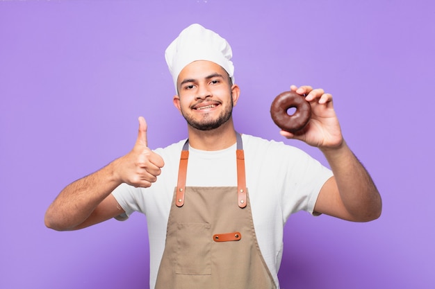 Expressão feliz de jovem hispânico. conceito de chef ou padeiro