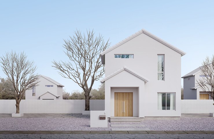 Exterior de la casa blanca de estilo minimalista, ventana de techo de vidrio y puerta de madera con cielo azul