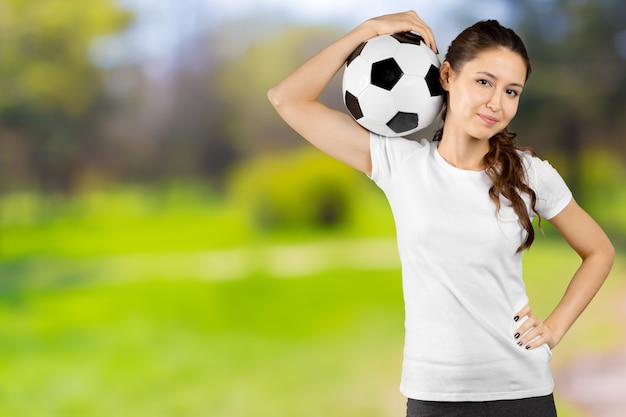Foto fã de futebol. jovem, mulher bonita, segurando, bola futebol, sobre, isolado