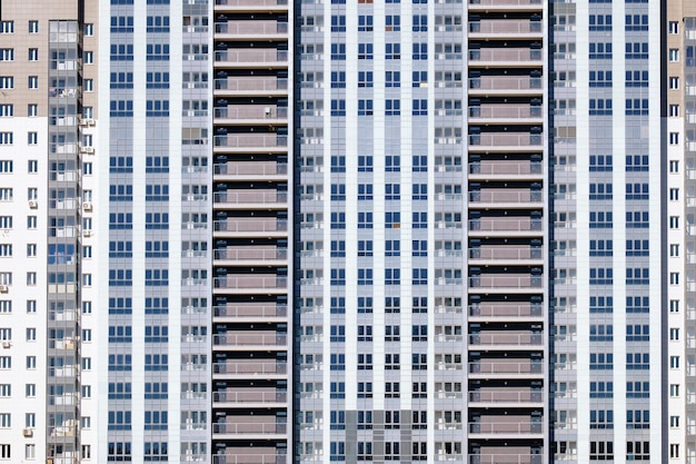 Fachada de colores brillantes de un edificio residencial Fondo abstracto de windows