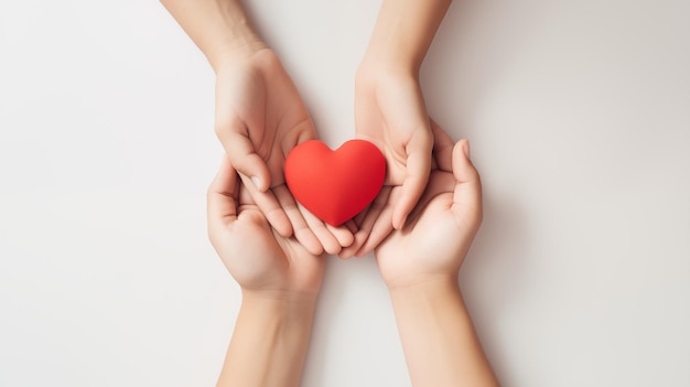 Família de mãos segurando coração vermelho coração seguro de saúde doação de órgãos feliz caridade voluntária