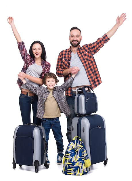 Foto família feliz com a bagagem está pronta para viajar.