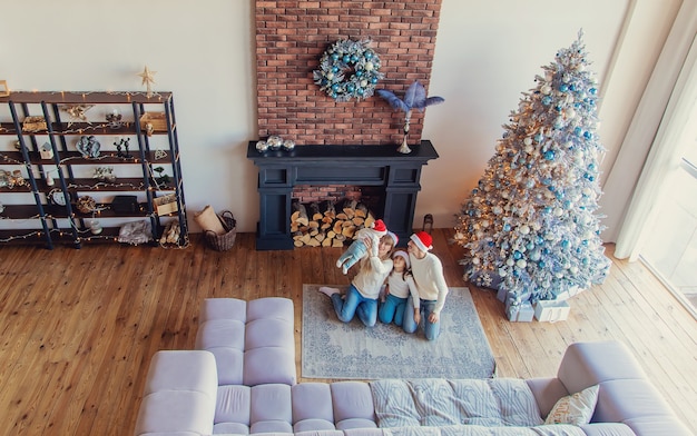 Familia de fotos de Navidad en casa