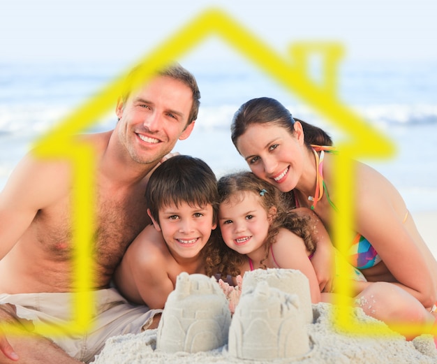 Familia en una playa con ilustración de casa amarilla