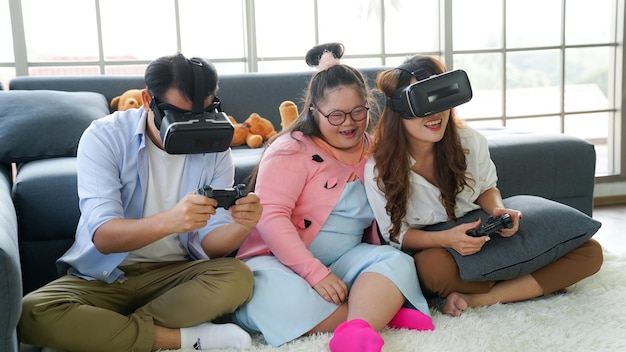 Foto las familias con síndrome de down están felices de jugar juntos