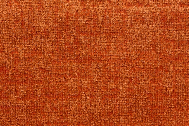 Fantastischer Textilhintergrund in gesättigter oranger Farbe