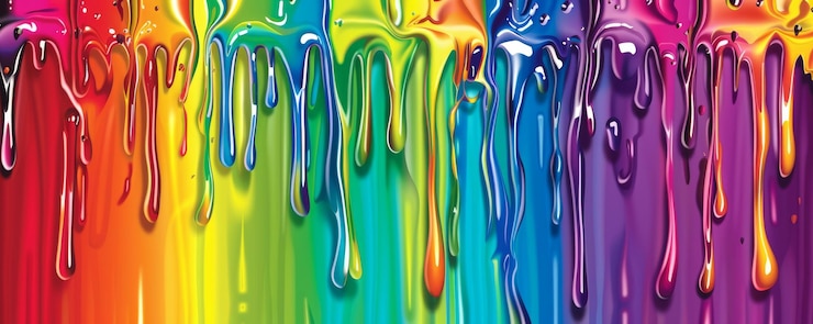 Foto farbige farbe tropft über eine leinwand und erzeugt einen lebendigen regenbogen-effekt