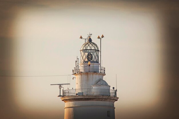 Farol de Málaga ao pôr do sol, Andaluzia, Espanha