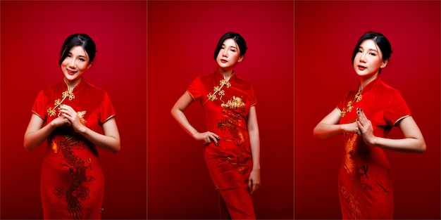 Fashion Beauty Woman hat langes, glattes schwarzes Haar, schaut in die Kamera und drückt das Gefühl aus, zu feiern. Porträt des asiatischen Mädchens tragen rotes chinesisches Kleid über rotem Hintergrund, Kopienraum