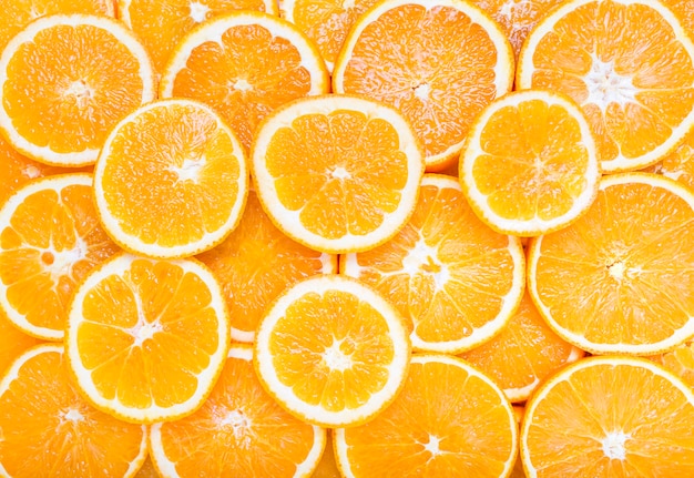 Foto fatias de fundo de frutas cítricas laranja
