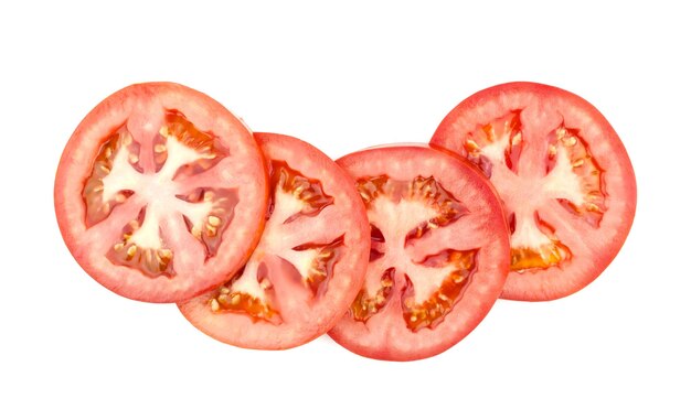 Foto fatias de tomate fresco isoladas no fundo branco