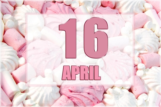 Fecha del calendario en el fondo de malvaviscos blancos y rosados 16 de abril es el decimosexto día del mes