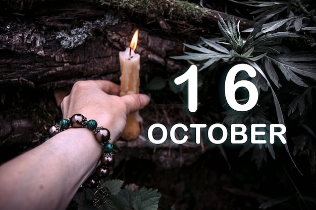 Fecha del calendario en el fondo de un ritual espiritual esotérico 16 de octubre es el decimosexto día del mes