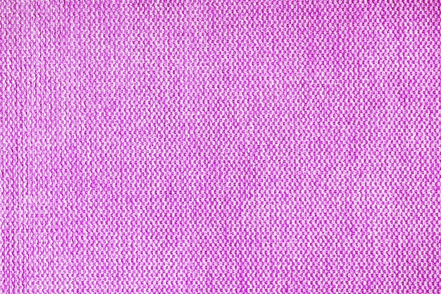 Fechar a textura do tecido de estofamento grosseiro roxo Fundo têxtil decorativo