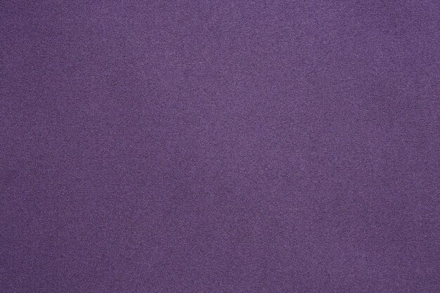 Fechar o fundo de textura de tecido roxo